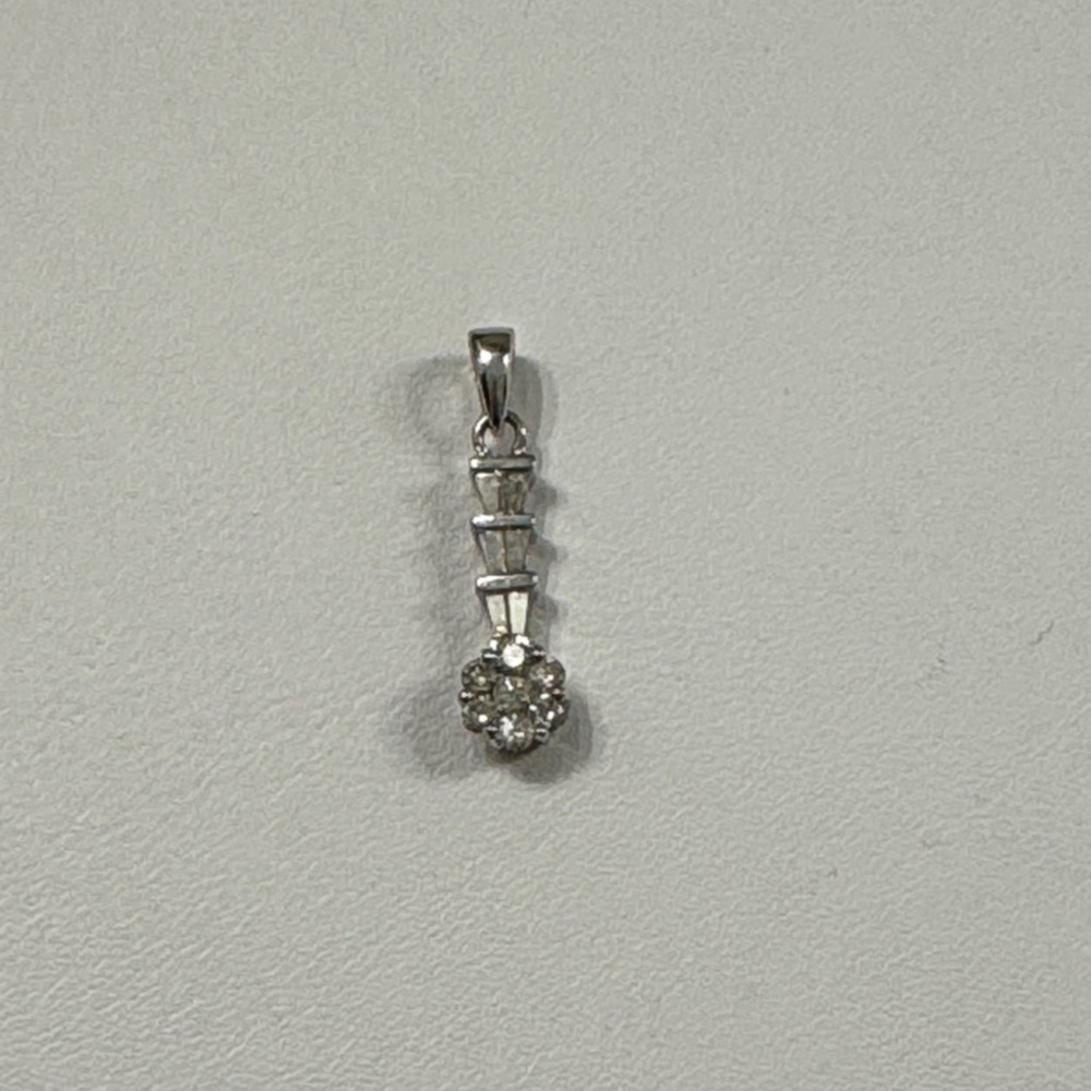 White gold and diamond pendant, in great condition.